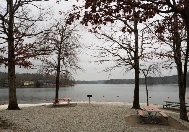 After a refreshing swim  at Desoto Beach, Hot Springs Village, Arkansas you can relax and enjoy a picnic at one of the available tables.  (photo courtesy of Karen Perry