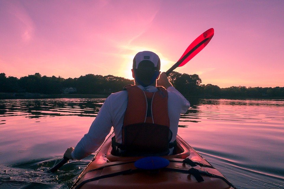 Man enjoys kayaking at one of HSV 11 lakes