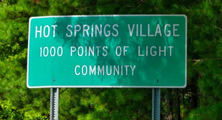 Hot Springs Village A community of light sign